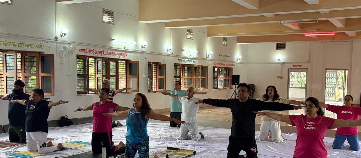 Group yoga session at the workshop